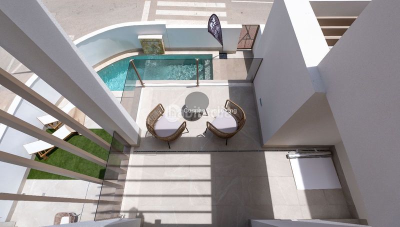 Foto fdfd6038-3c40-4ebb-80d8-8956a3765433. Casa adossada amb calefacció aparcament piscina a Alcázares (Los)