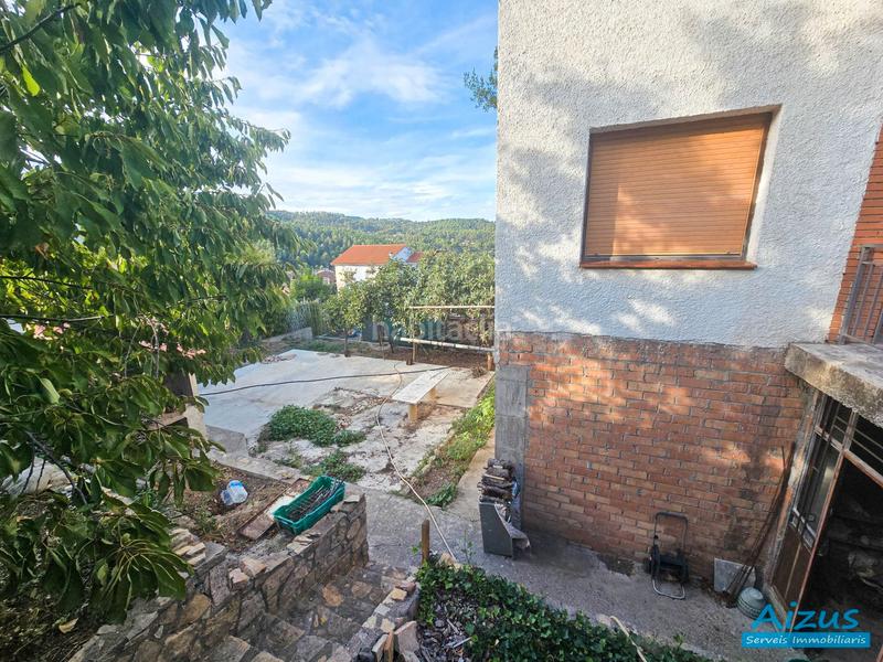 Foto 3876fd98-93d8-46a5-8ecc-7eb2ebb3c66b. Casa amb xemeneia a Corbera de Llobregat