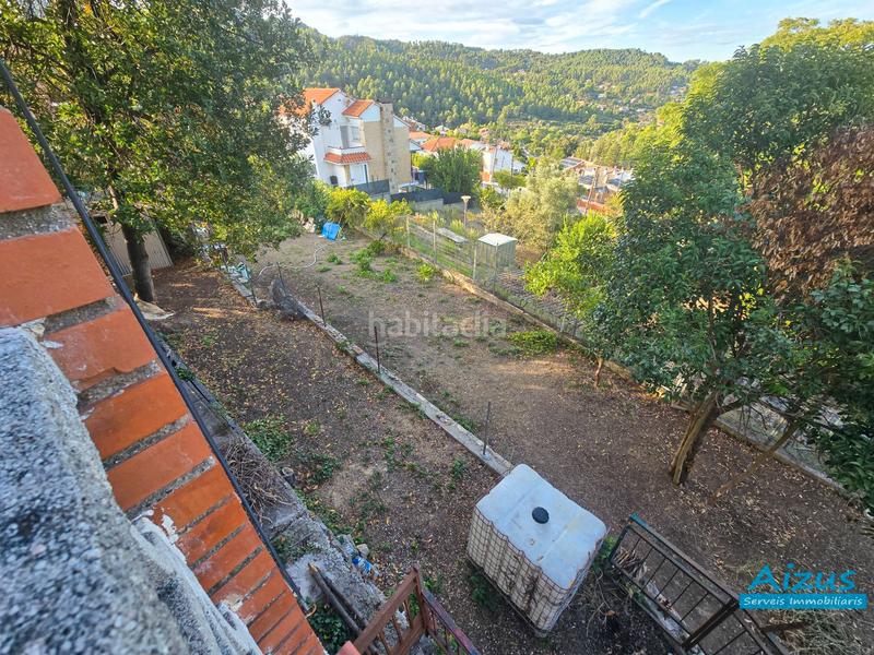 Foto 80bd8414-96cf-4a8c-946c-7f98273489b1. Casa amb xemeneia a Corbera de Llobregat