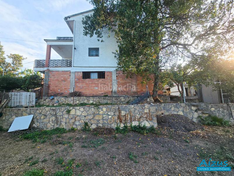 Foto 8f9b1f04-71af-42f9-ab8b-1e3fa128462d. Casa amb xemeneia a Corbera de Llobregat