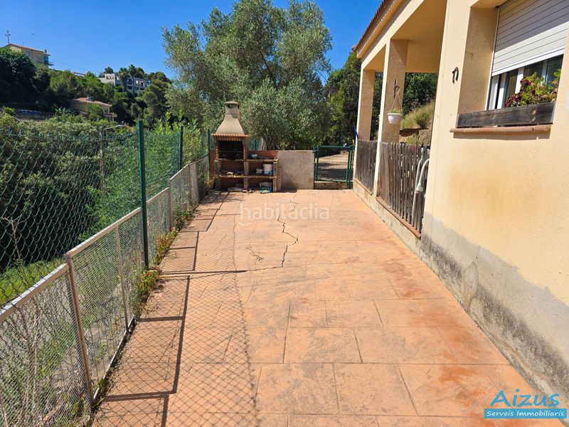 Foto 05f1bcd5-ba1d-47f7-aa87-7d5e9108b6b7. Casa amb xemeneia aparcament a Santa Susanna