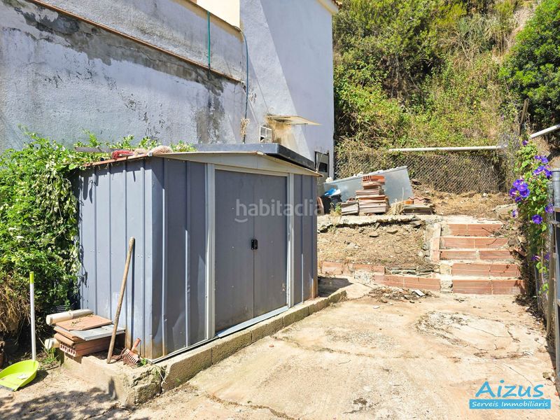 Foto 78806a82-fe4d-4c8b-9088-6a9ae8e7f2ef. Casa amb xemeneia aparcament a Santa Susanna