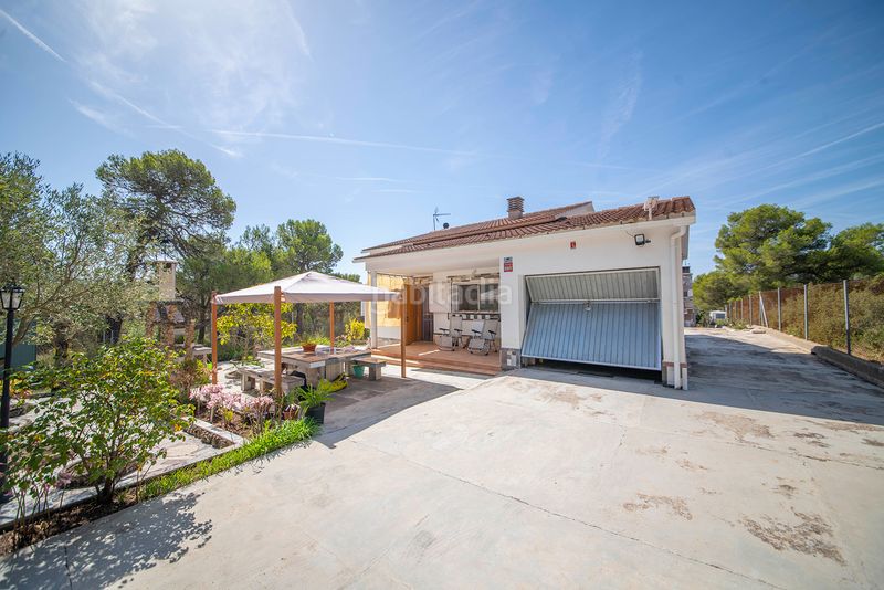 Foto 04c32aa8-fee1-49ef-b1c5-75eb20e65da1. Casa amb xemeneia aparcament a Querol