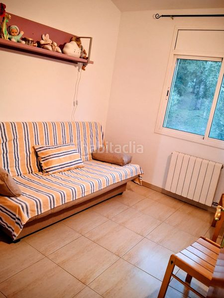 Foto 15f4bdd4-7e62-44d1-89ba-b2d168d2d608. Casa aparellada amb calefacció aparcament a Caldes de Malavella