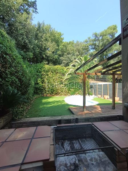 Foto d59f2870-ba46-4b20-ba17-43106345fab4. Casa adossada amb calefacció aparcament piscina a Girona