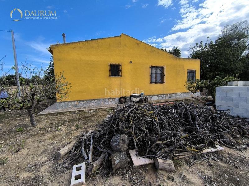 Foto 915115f5-fbce-4b6d-95f4-0f407af13f5f. Chalet avec parking dans La Marina Elche / Elx