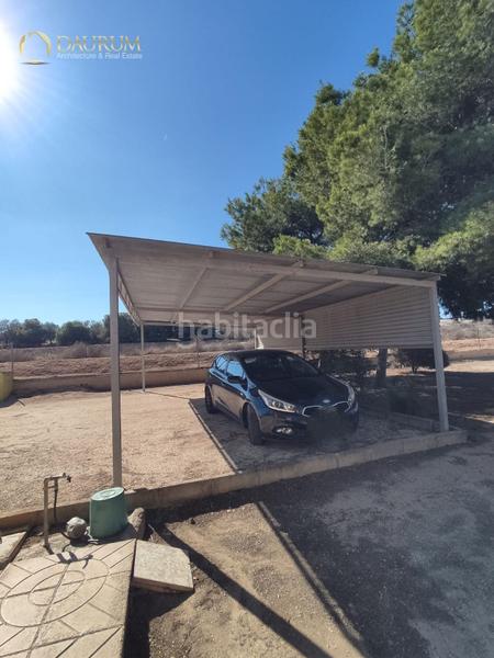 Foto b3c37dac-21b8-4332-a66d-42564c39dd11. Chalet avec parking dans La Marina Elche / Elx