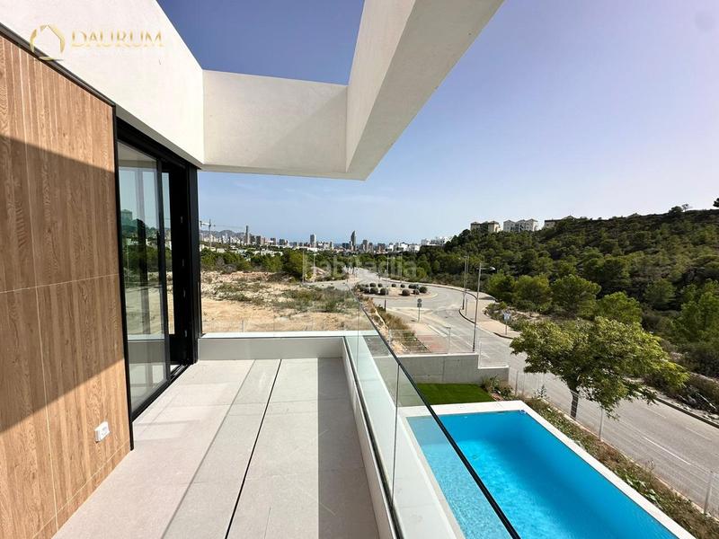 Foto b21d48eb-5e07-495e-9a1e-154f1c957236. Casa con riscaldamento parcheggio piscina in balcón de Finestrat-terra marina Finestrat