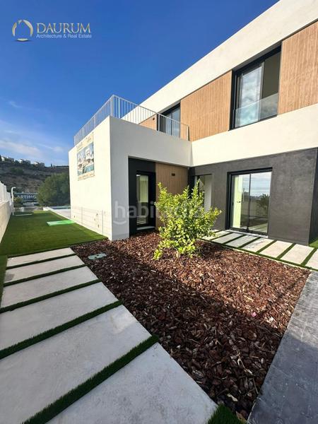 Foto c6e8cb8f-cf1a-462c-b6a2-c1039d4533be. Casa con riscaldamento parcheggio piscina in balcón de Finestrat-terra marina Finestrat