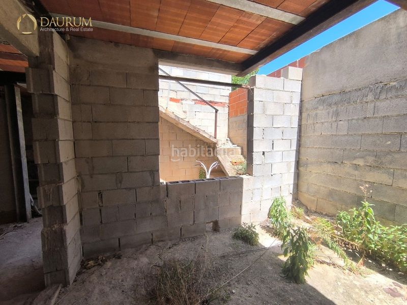 Foto 06ad759e-fe6d-448f-b4e8-9732fb9f285a. Casa aparellada amb aparcament a Aigües