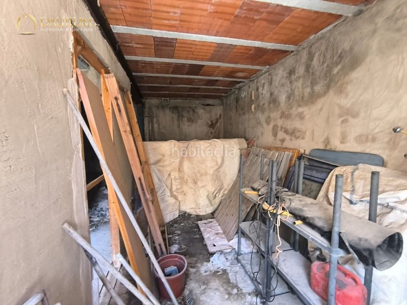 Foto 8cd71f90-6770-4b8b-9a99-d65d38e4c15b. Casa aparellada amb aparcament a Aigües