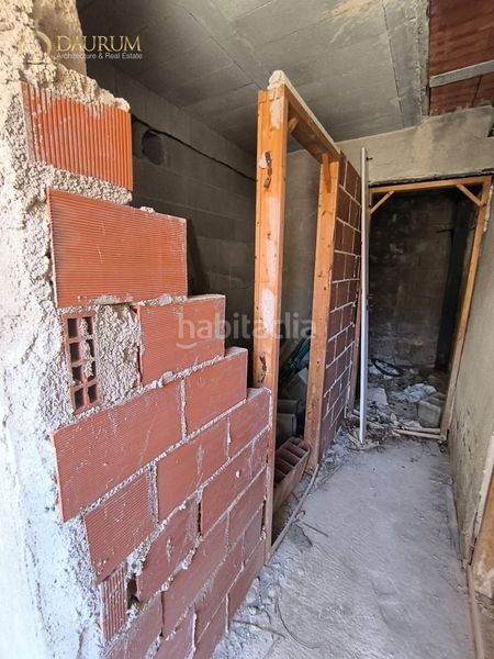 Foto 906580c9-b4f2-4e98-8bd8-0180a3e39ac0. Casa aparellada amb aparcament a Aigües
