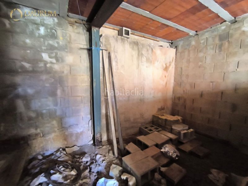 Foto a0678955-23cd-44d7-83b7-58a1c3dc4795. Casa aparellada amb aparcament a Aigües
