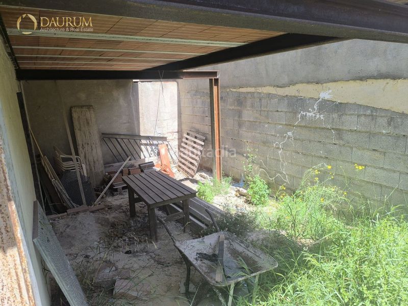 Foto c6150cc5-5c66-4a80-9d7e-f5953c0831bc. Casa aparellada amb aparcament a Aigües