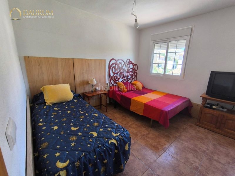 Foto ef7b8291-9b82-4d53-89db-901122c04047. Casa aparellada amb aparcament a Aigües