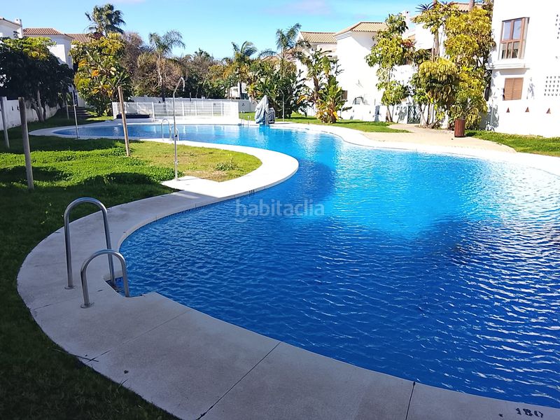 Foto 14764279-95b2-455c-a9b3-5a6479e38d35. Planta baixa amb aparcament piscina a La Alcaidesa