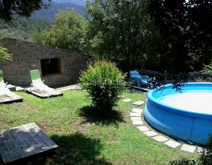 Foto 53cae31e-c377-4d6b-b7dc-5bce6ffbc30e. Casa amb calefacció a Sales de Llierca