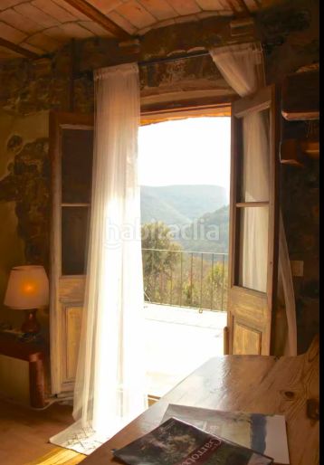 Foto 781f3980-9cd9-4ad5-aab1-e7660ef6fe7b. Casa amb calefacció a Sales de Llierca