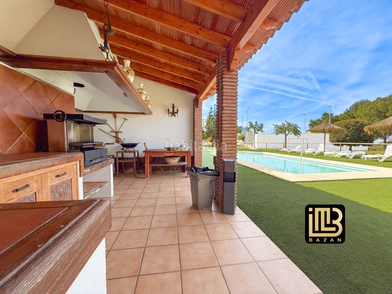 Foto 90ea71d3-82d8-4dab-849e-c2d7b04d51f3. Casale con camino riscaldamento parcheggio piscina in Málaga