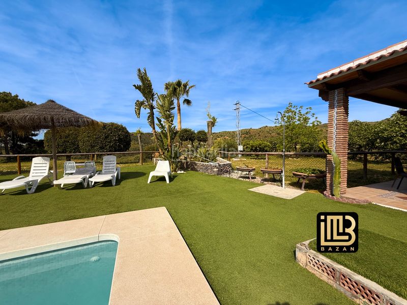 Foto eda766a7-5e1a-4115-87fd-f4a4a7533f15. Casale con camino riscaldamento parcheggio piscina in Málaga