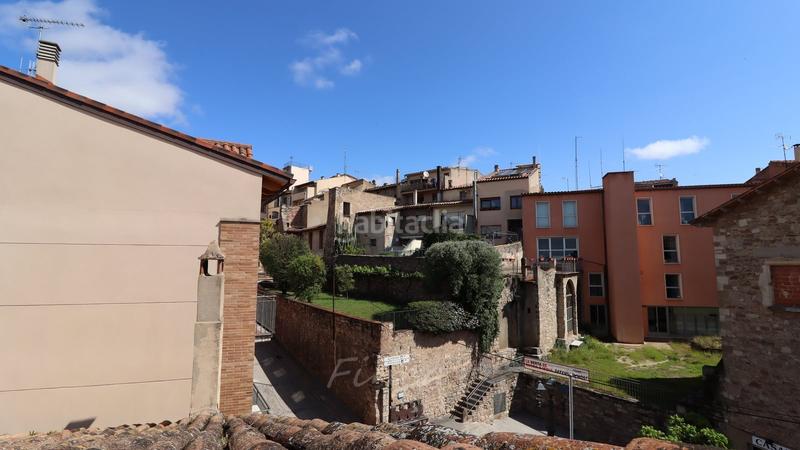 Foto f943c6ad-9c5c-42a6-ad52-abc355556d37. Edifici a carrer del comerç 2 a Moià