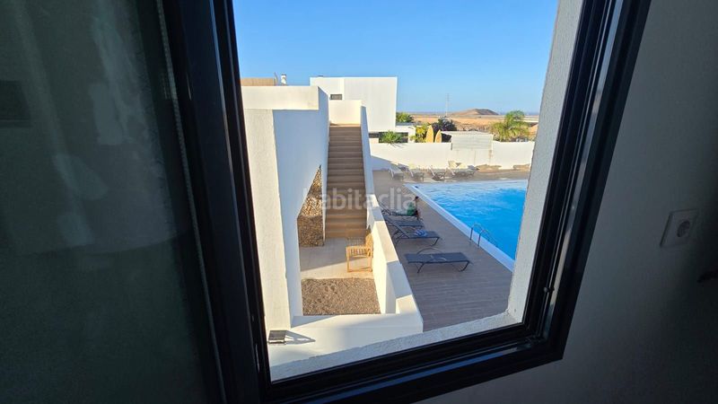 Foto 3339483d-048e-45a3-8d92-a7ee1077c265. Casa adossada a Corralejo Oliva (La)