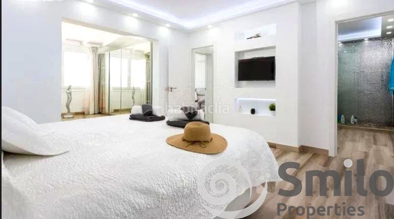 Foto 00cb25a4-6031-4590-af0e-335794b3f557. Casa amb aparcament piscina a Playa Fañabé Alto Adeje