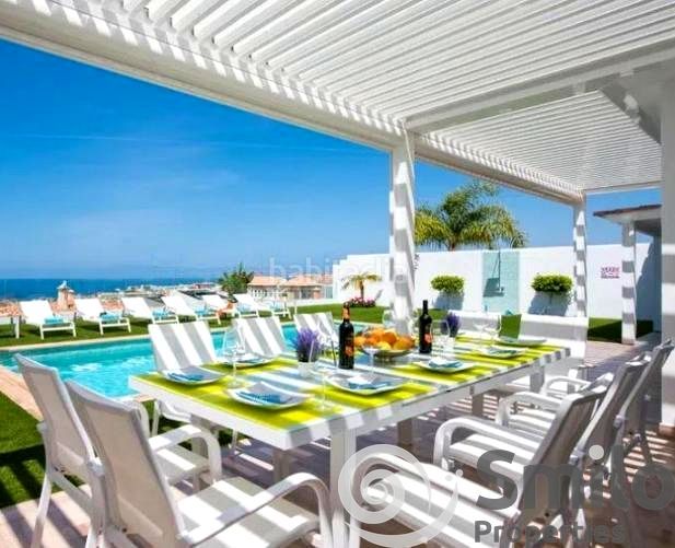 Foto 923ae5fc-8d01-4491-bb69-6dbe9e74a295. Casa amb aparcament piscina a Playa Fañabé Alto Adeje