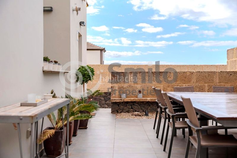 Foto 981fc54d-48fc-4645-8748-7a61b058629e. Casa amb aparcament piscina a Playa Fañabé Alto Adeje