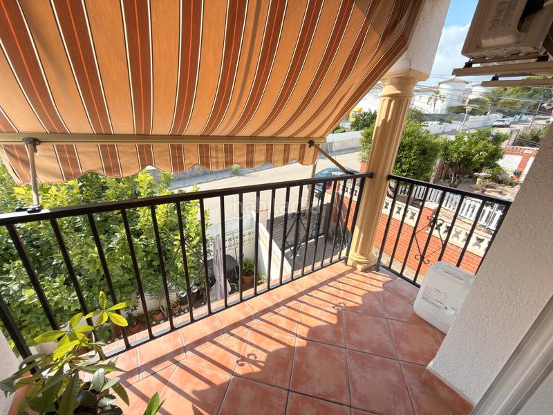 Foto 750e32da-f73d-47c2-8cab-077dc16df84a. Casa aparellada amb xemeneia calefacció aparcament a Coma-ruga