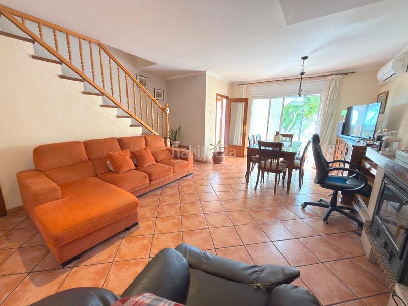 Foto 74af1563-fdf2-421f-a85e-5c5a16b1de08. Towny house with fireplace heating parking in Els Masos - Els Garrofers Coma-ruga