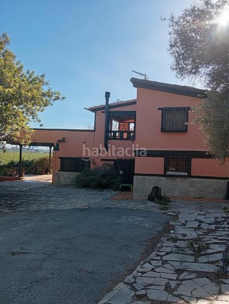 Foto fbf73a6d-6431-4f58-a2e4-25ec75595469. Casa amb xemeneia aparcament a Ciutat del Transport - La Salera Castellón de la Plana