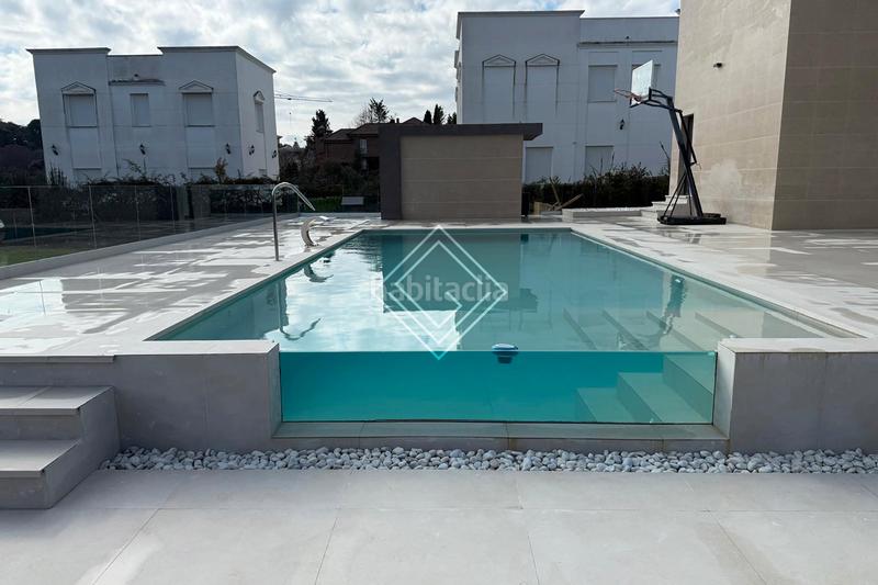 Foto 82a7a0a9-842e-4432-b4f1-9c5e988b73b7. Chalet with fireplace heating parking pool in Ciudalcampo