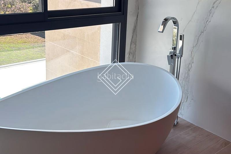 Foto e3247043-e623-4b4e-a50e-06200a0e9004. Chalet with fireplace heating parking pool in Ciudalcampo