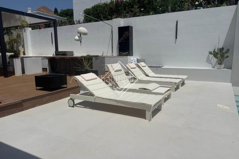 Foto 5f40881d-3111-4763-8bf5-80ddaca6f855. Casa amb aparcament piscina a Las Brisas Marbella