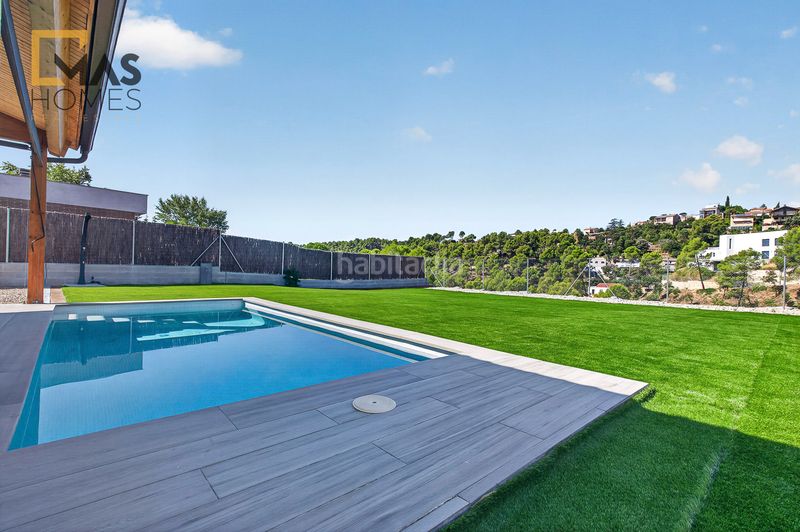 Foto bca5e507-fc25-4120-bf3f-c7de692f6a03. Casa amb xemeneia aparcament piscina a Viladecavalls
