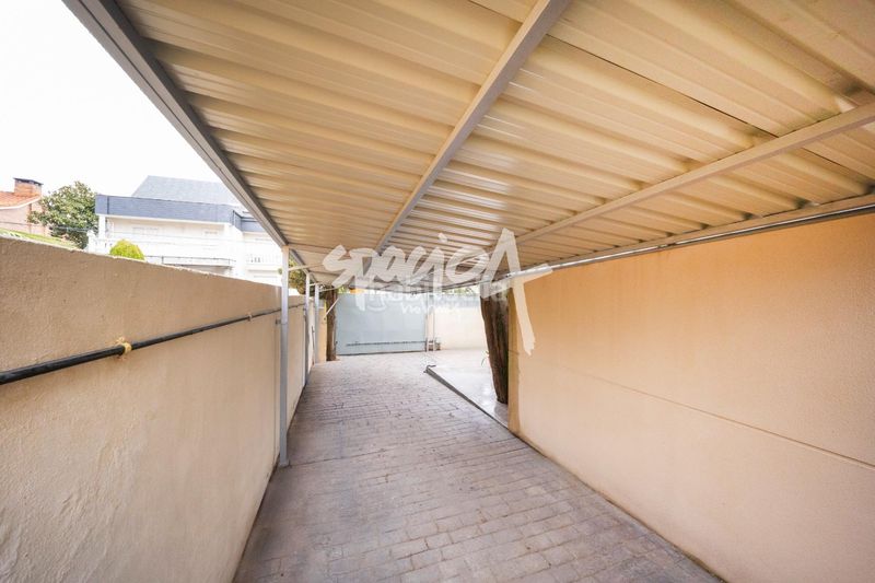 Foto ce1e018f-e7b7-415b-b5ad-04c578dedb81. Casa aparellada amb calefacció aparcament piscina a Rozas de Madrid (Las)