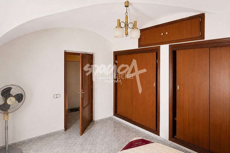 Foto dfe713cc-e19a-44ce-bd06-5e2edc31b81b. Casa adossada a Madroñera