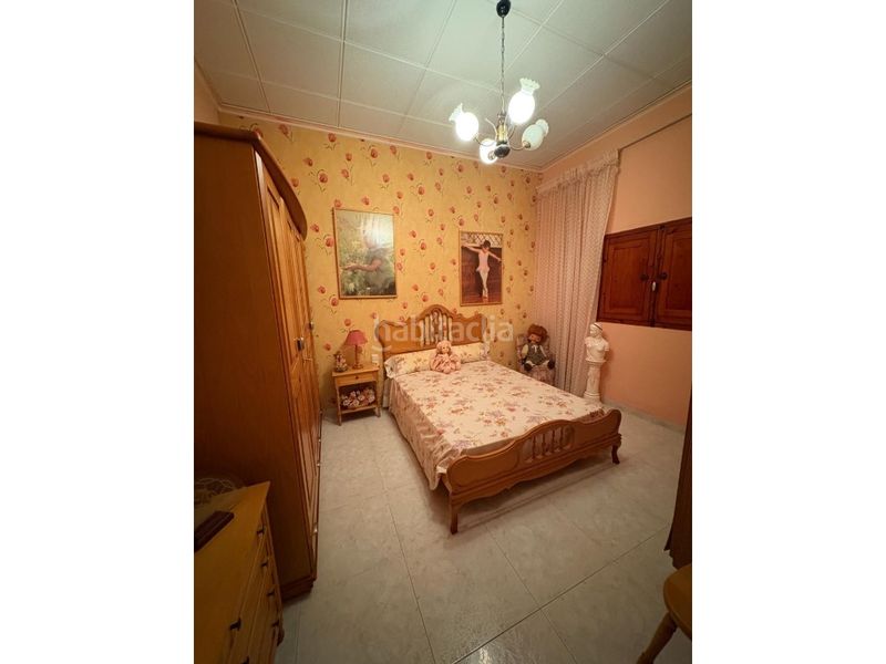 Foto 14970c5f-bcb7-4f9f-bbd6-a9bc001e77f5. Casa amb aparcament a Alberic