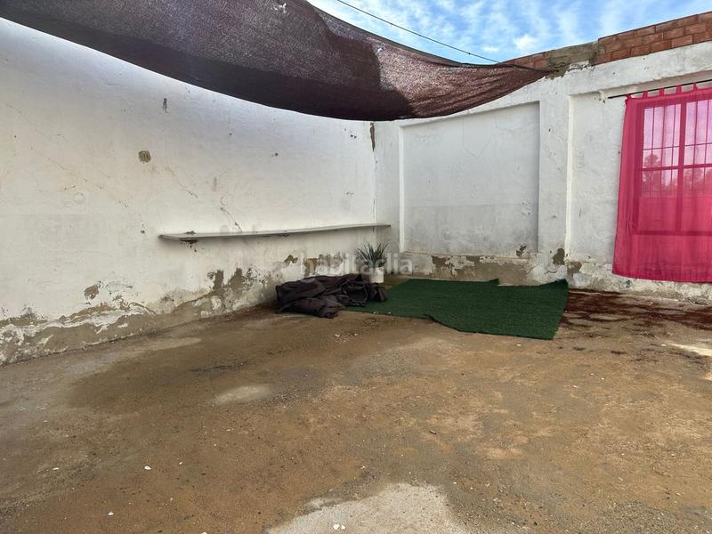 Foto eb370ef6-cb97-4e4f-9938-b3428edb5a33. Casa con riscaldamento parcheggio in Lora del Río