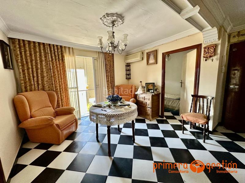 Foto a6f4850a-4981-4bc3-b7a5-db9bc143693d. Piso  situado en tercera planta en la zona de los piso que dispone de 3 dormitorios, baño, cocina amueblada salón comedor con acces en Lora del Río
