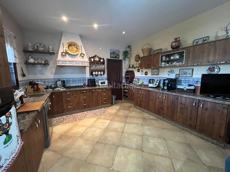 Foto 6516d23f-c49e-44a1-b56f-b558e0cc8552. Chalet con piscina in Sanlúcar la Mayor