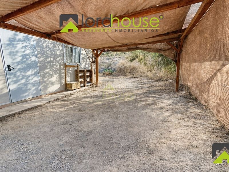 Foto f281fd8d-caf5-44b2-a228-8851107cc860. Casa amb aparcament a Aguaderas Lorca