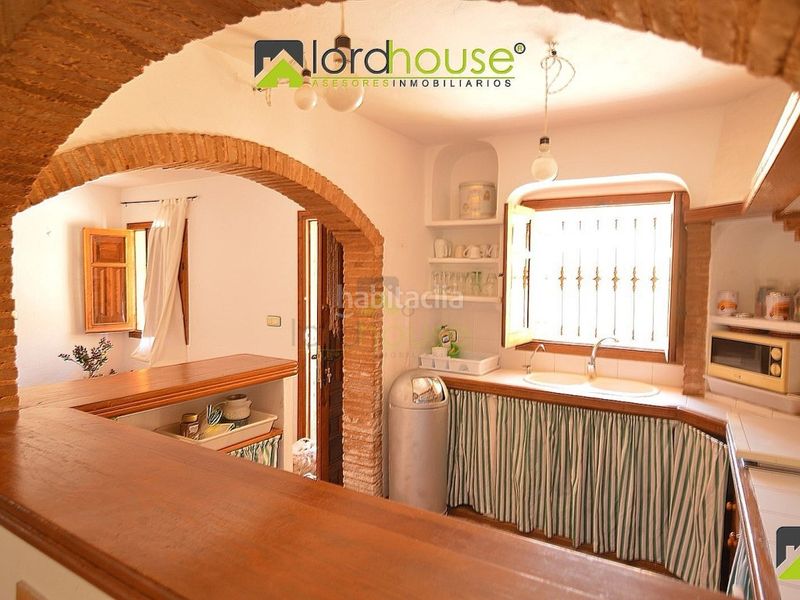 Foto d41d6b1c-6f5e-4f15-90a4-62bea17707a8. Casa amb aparcament a Águilas