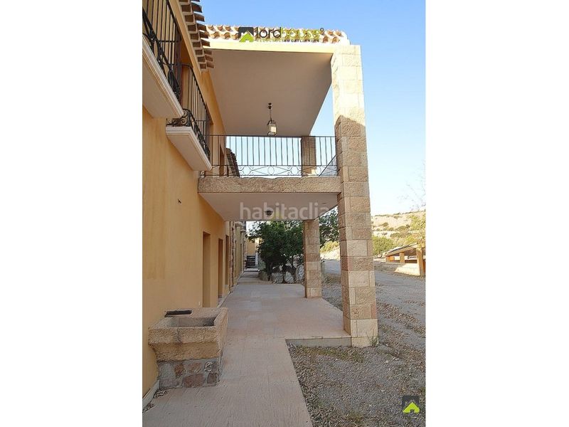 Foto efa3a051-acc2-49dc-818e-11b521388341. Casa amb aparcament a Águilas
