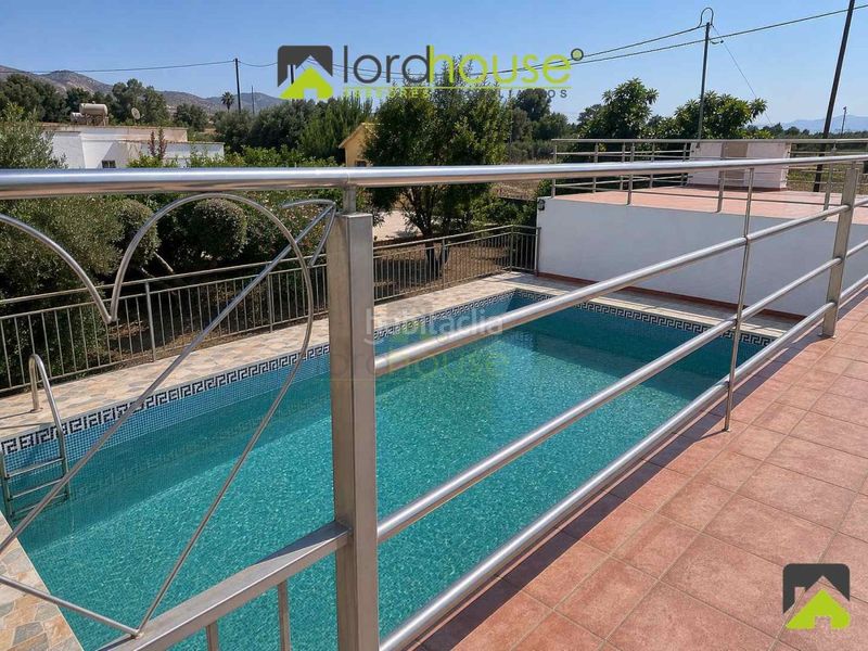 Foto 9112a3db-7b61-4884-abe7-7ff36c2d132c. Casa amb aparcament a Purias Lorca