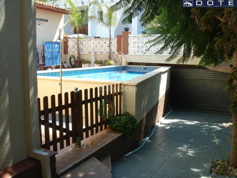 Foto 597acddd-e1e9-4f43-b8ca-f4e65cbe306b. Casa a schiera con parcheggio piscina in La Mora Tarragona
