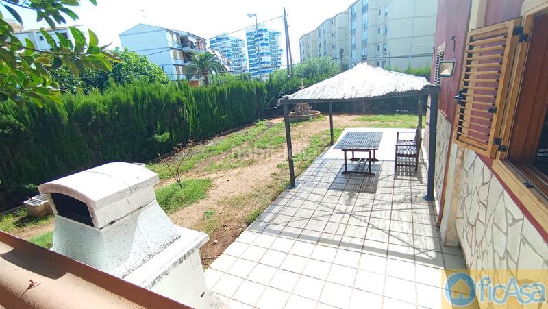 Foto 7888fbdb-c74a-4b6a-9ddf-bdb6282689c3. Casa adossada amb aparcament piscina a Heliópolis Benicasim / Benicàssim