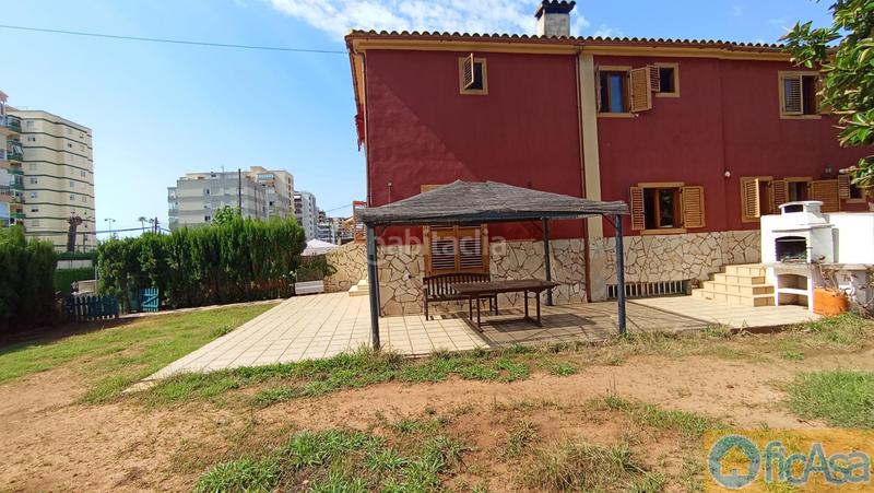 Foto d4eec1c1-1b4b-41a0-a286-0cecc2f93064. Casa adossada amb aparcament piscina a Heliópolis Benicasim / Benicàssim