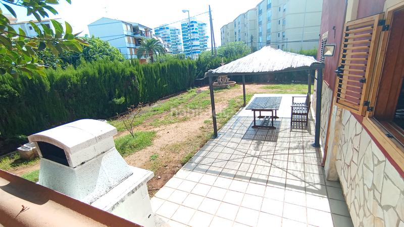 Foto bdd9b50e-0b00-4f8a-891f-fc75248549e9. Casa adossada amb aparcament piscina a La Curva Benicasim / Benicàssim